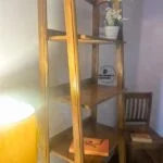 Staircase bookshelf with Rattan mesh door