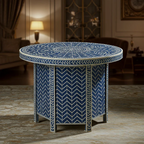 Decorative round table with blue and white pattern in a room setting