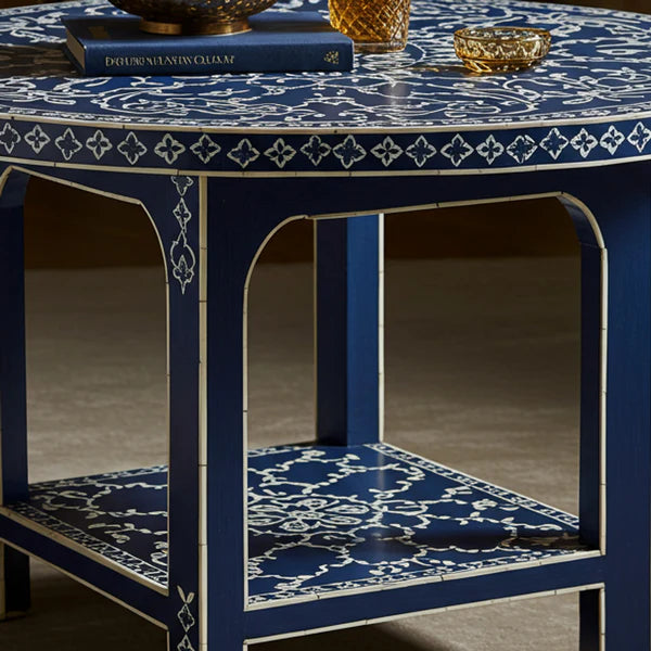 Blue and white patterned side table with decorative items on a neutral background